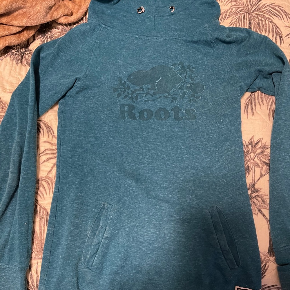 Blue long style pull over sweater.